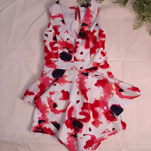 Pink and white peplum romper - Picture 1 of 4